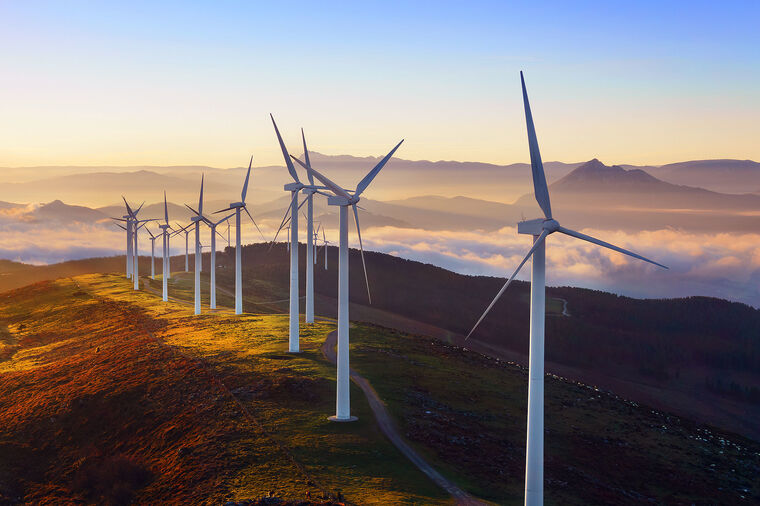 Wind Turbines Sunset Mountains Clouds